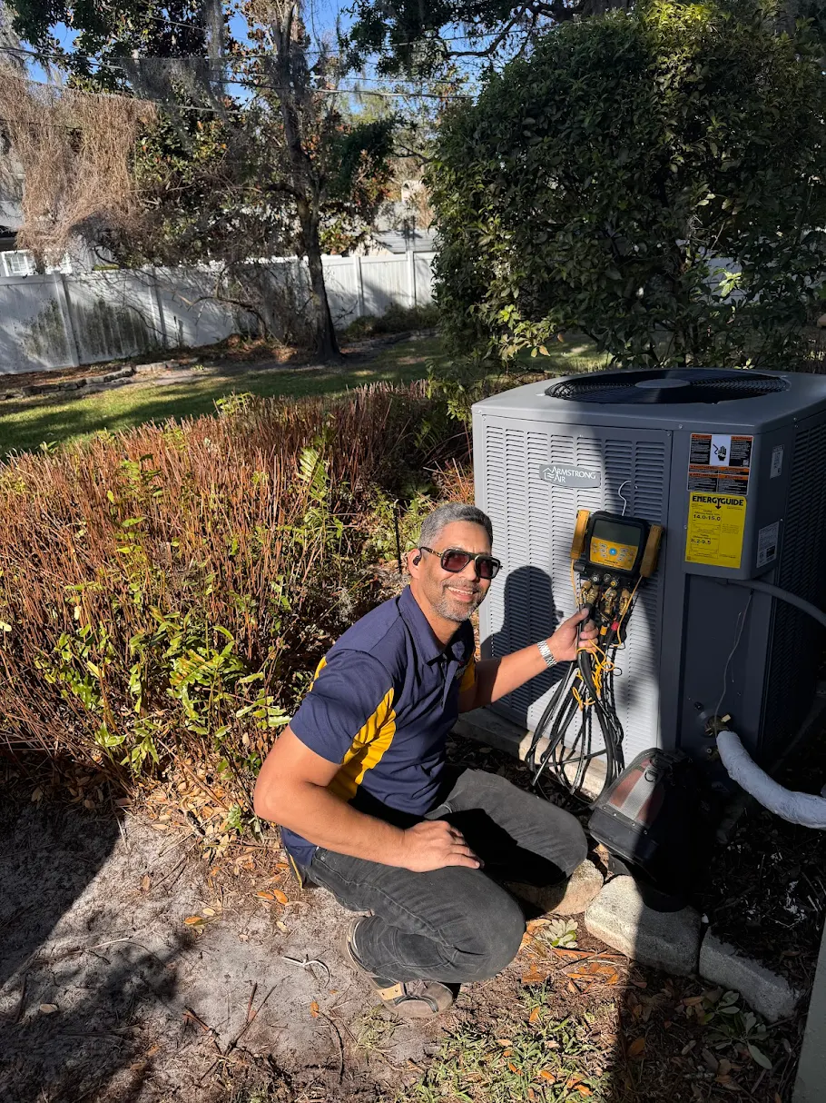 Certified technician diagnosing a complex commercial HVAC breakdown
