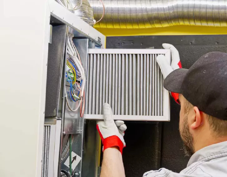 Professional emergency AC repair service being performed on an outdoor unit